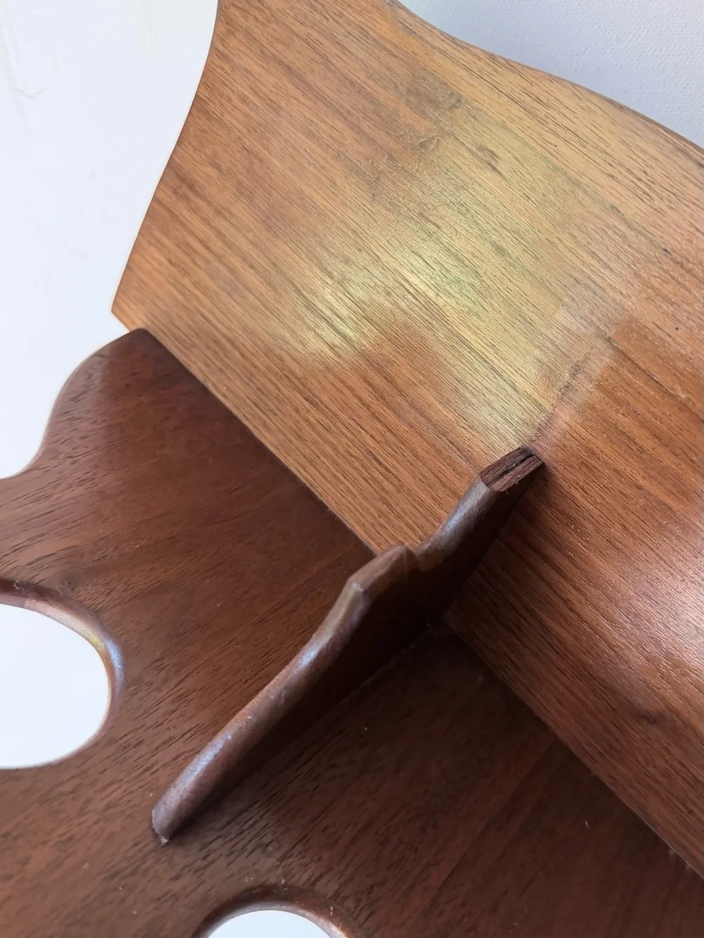 vintage wall sconce shelf made of carved wood with a dark finish